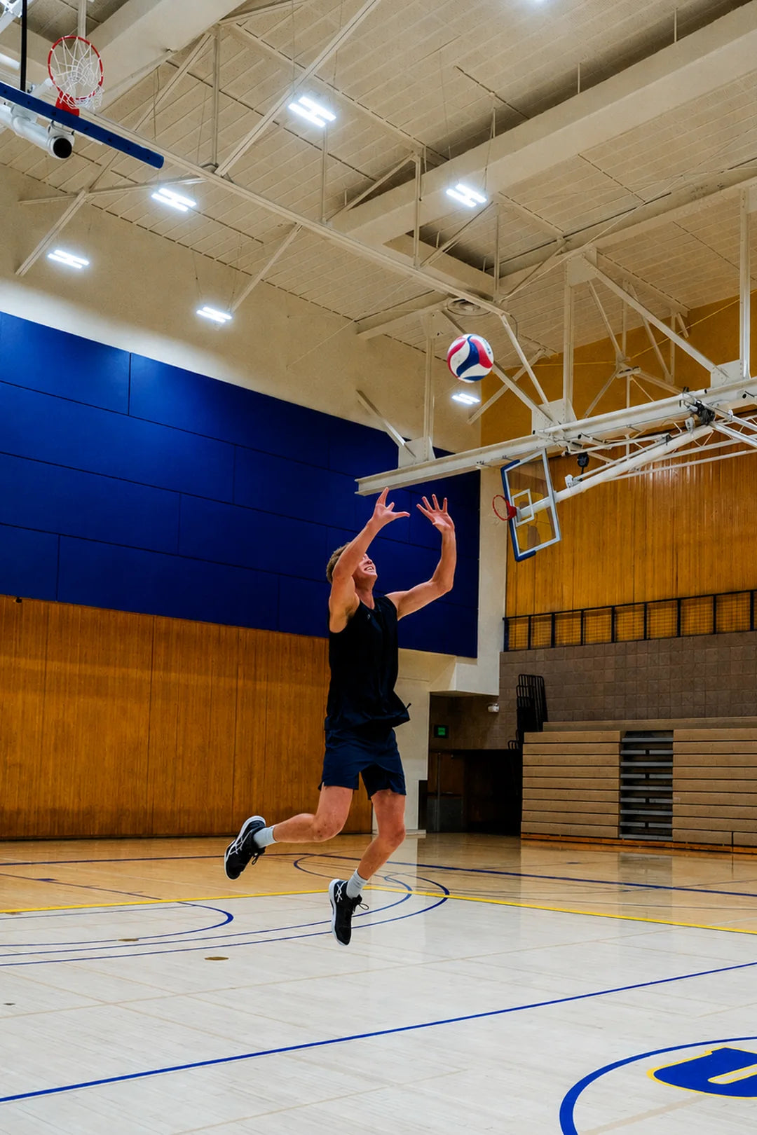 Volleyball player rising for a jump serve