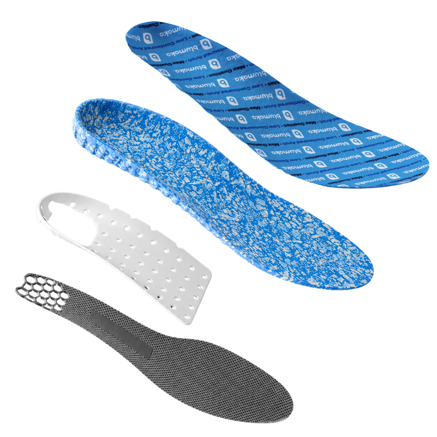 Exploded view of the four Performance Insole layers: printed top cover, recycled ETPU foam, molded arch support and traction layer