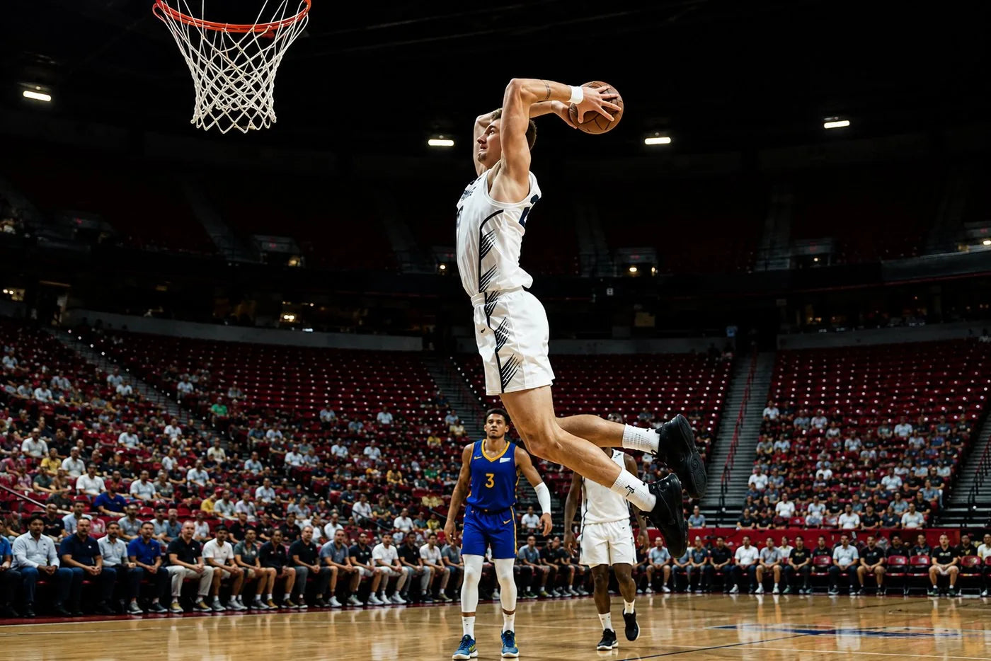 Carson Cooper going up under the basket for Michigan State