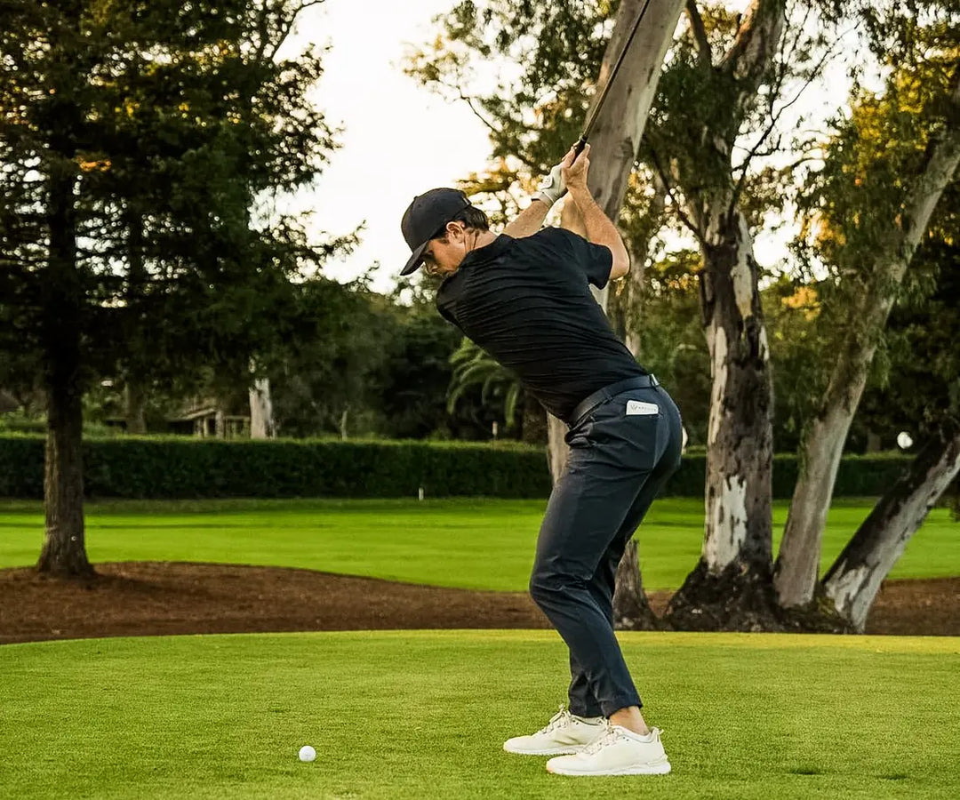 Connor Moore addressing the ball wearing Blumaka NonSlip insoles