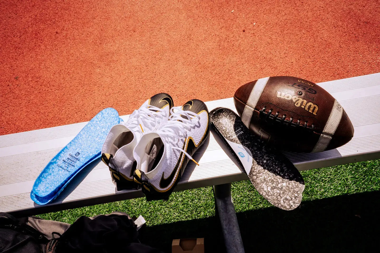 Blumaka NonSlip insoles in football cleats on the field
