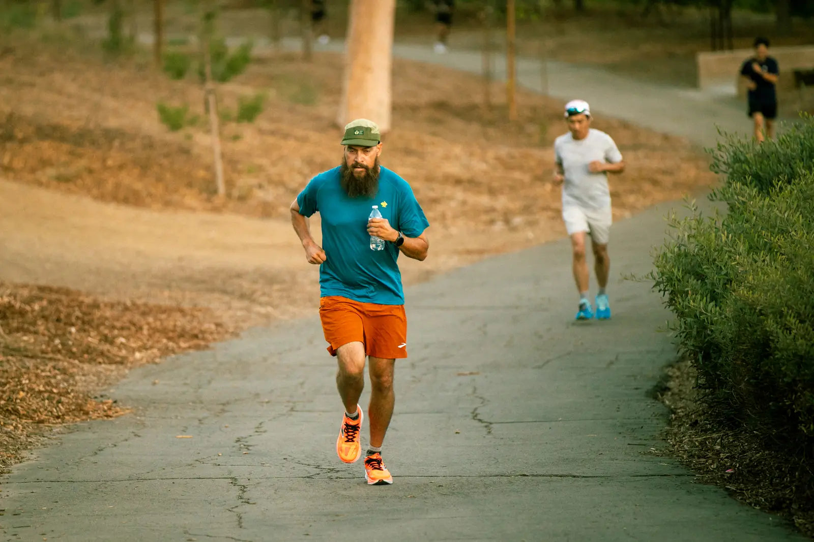 Runner on a paved park path