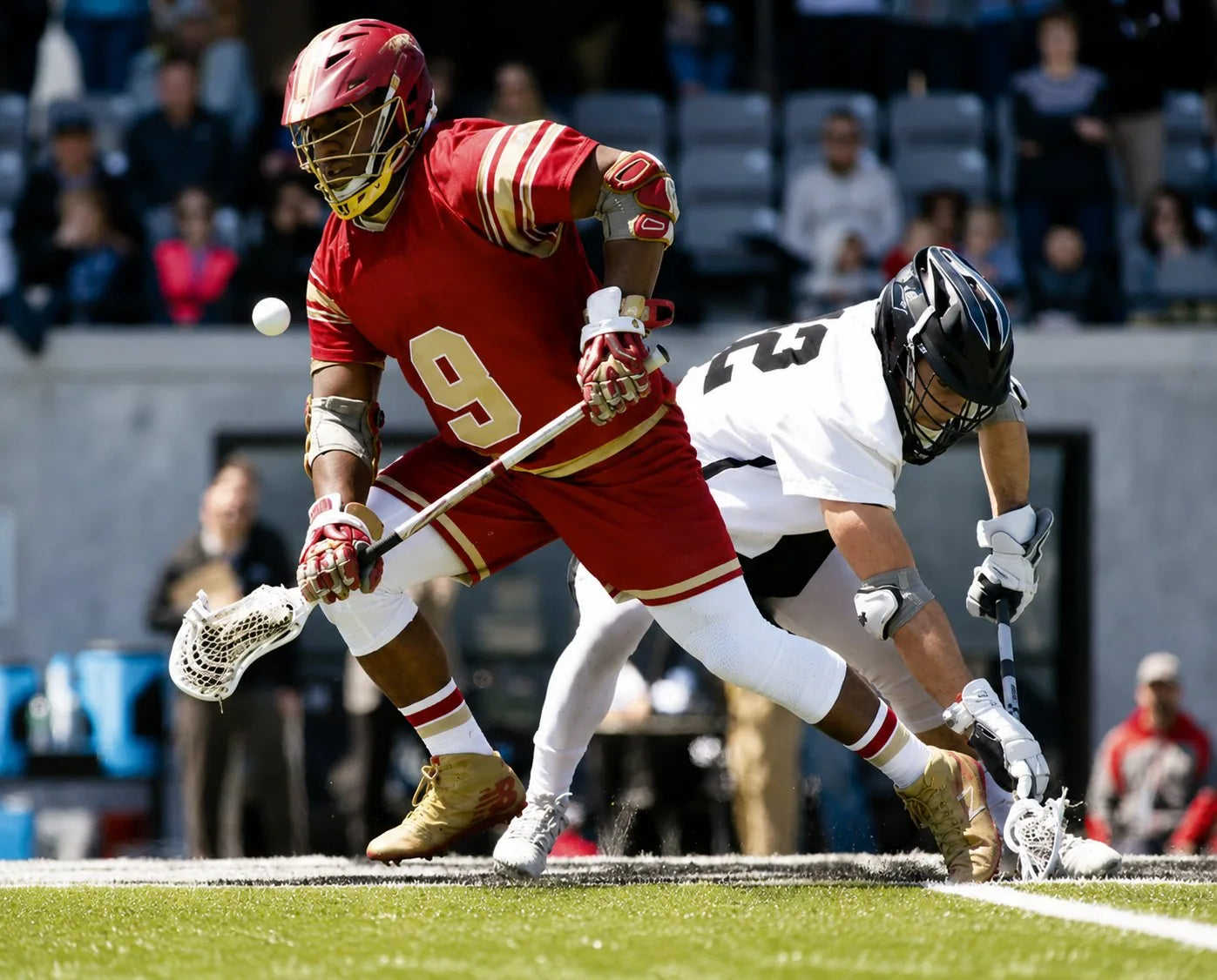 Trevor Baptiste battling for a faceoff
